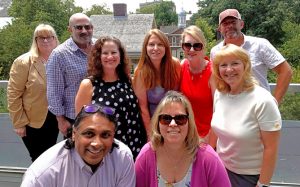 BNO staff standing on the balcony of the Philadelphia office.